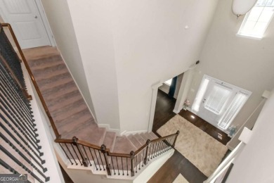 Set on a large golf course lot, this 5 bedroom, 4 bath home on The Club at Shoal Creek Golf Course in Georgia - for sale on GolfHomes.com, golf home, golf lot