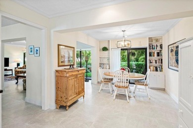 Discover the ultimate blend of elegance and effortless living in on Quail Ridge Golf Course and Country Club in Florida - for sale on GolfHomes.com, golf home, golf lot