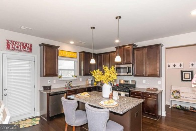 Set on a large golf course lot, this 5 bedroom, 4 bath home on The Club at Shoal Creek Golf Course in Georgia - for sale on GolfHomes.com, golf home, golf lot