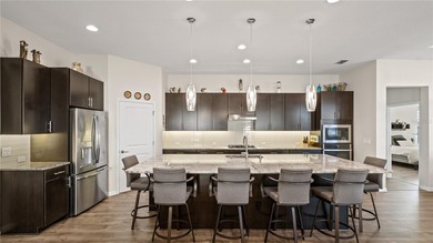 Beautiful Dominica style home featuring 3 bedrooms, 2.5 baths on Mystic Dunes Resort and Golf Club in Florida - for sale on GolfHomes.com, golf home, golf lot