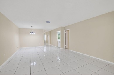 Stunning 2-Bed, 2-Bath Condo in a Gated Community with on Boca Lago Golf and Country Club in Florida - for sale on GolfHomes.com, golf home, golf lot