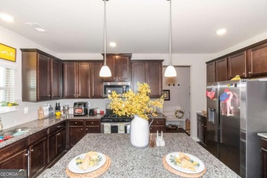 Set on a large golf course lot, this 5 bedroom, 4 bath home on The Club at Shoal Creek Golf Course in Georgia - for sale on GolfHomes.com, golf home, golf lot
