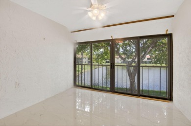 Stunning 2-Bed, 2-Bath Condo in a Gated Community with on Boca Lago Golf and Country Club in Florida - for sale on GolfHomes.com, golf home, golf lot