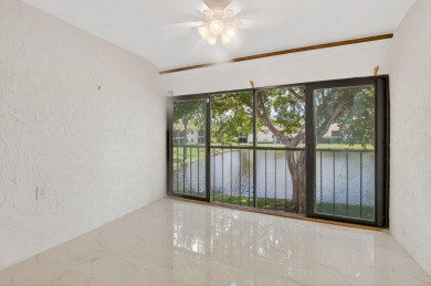 Stunning 2-Bed, 2-Bath Condo in a Gated Community with on Boca Lago Golf and Country Club in Florida - for sale on GolfHomes.com, golf home, golf lot