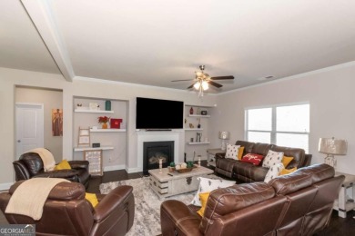 Set on a large golf course lot, this 5 bedroom, 4 bath home on The Club at Shoal Creek Golf Course in Georgia - for sale on GolfHomes.com, golf home, golf lot