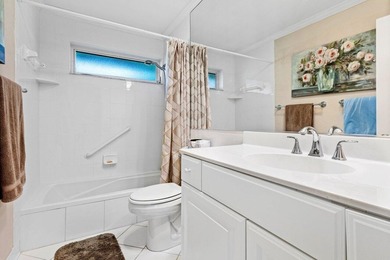 Discover the ultimate blend of elegance and effortless living in on Quail Ridge Golf Course and Country Club in Florida - for sale on GolfHomes.com, golf home, golf lot