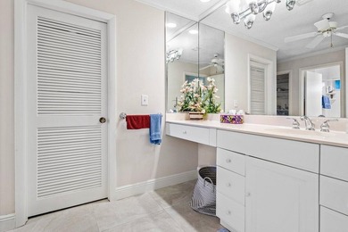 Discover the ultimate blend of elegance and effortless living in on Quail Ridge Golf Course and Country Club in Florida - for sale on GolfHomes.com, golf home, golf lot