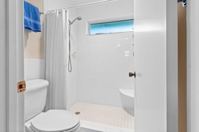 Discover the ultimate blend of elegance and effortless living in on Quail Ridge Golf Course and Country Club in Florida - for sale on GolfHomes.com, golf home, golf lot