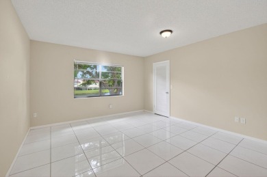 Stunning 2-Bed, 2-Bath Condo in a Gated Community with on Boca Lago Golf and Country Club in Florida - for sale on GolfHomes.com, golf home, golf lot