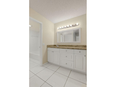 Stunning 2-Bed, 2-Bath Condo in a Gated Community with on Boca Lago Golf and Country Club in Florida - for sale on GolfHomes.com, golf home, golf lot