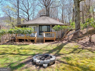 Escape to your own private mountain retreat in beautiful Sky on Sky Valley Resort and Country Club in Georgia - for sale on GolfHomes.com, golf home, golf lot