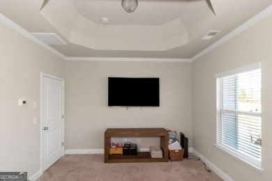 Set on a large golf course lot, this 5 bedroom, 4 bath home on The Club at Shoal Creek Golf Course in Georgia - for sale on GolfHomes.com, golf home, golf lot