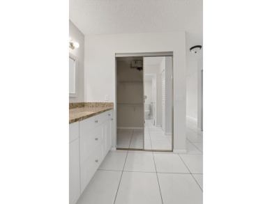Stunning 2-Bed, 2-Bath Condo in a Gated Community with on Boca Lago Golf and Country Club in Florida - for sale on GolfHomes.com, golf home, golf lot