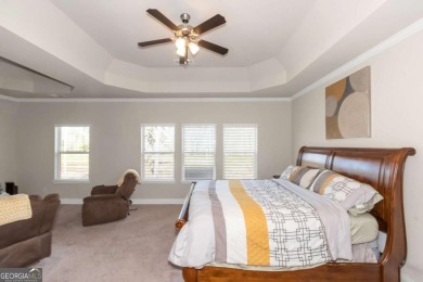 Set on a large golf course lot, this 5 bedroom, 4 bath home on The Club at Shoal Creek Golf Course in Georgia - for sale on GolfHomes.com, golf home, golf lot
