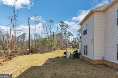 Set on a large golf course lot, this 5 bedroom, 4 bath home on The Club at Shoal Creek Golf Course in Georgia - for sale on GolfHomes.com, golf home, golf lot