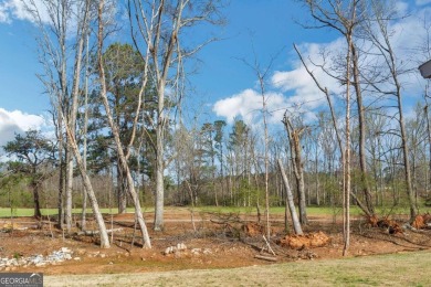 Set on a large golf course lot, this 5 bedroom, 4 bath home on The Club at Shoal Creek Golf Course in Georgia - for sale on GolfHomes.com, golf home, golf lot