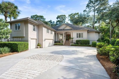 This stunning residence in the private Long Cove Club boasts on Long Cove Club in South Carolina - for sale on GolfHomes.com, golf home, golf lot