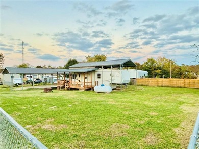 Discover the ultimate Lake Fork retreat with this fully fenced on Links At Lands End in Texas - for sale on GolfHomes.com, golf home, golf lot