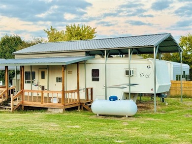 Discover the ultimate Lake Fork retreat with this fully fenced on Links At Lands End in Texas - for sale on GolfHomes.com, golf home, golf lot