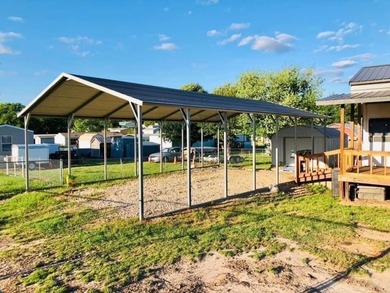 Discover the ultimate Lake Fork retreat with this fully fenced on Links At Lands End in Texas - for sale on GolfHomes.com, golf home, golf lot