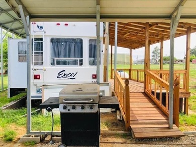 Discover the ultimate Lake Fork retreat with this fully fenced on Links At Lands End in Texas - for sale on GolfHomes.com, golf home, golf lot