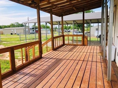 Discover the ultimate Lake Fork retreat with this fully fenced on Links At Lands End in Texas - for sale on GolfHomes.com, golf home, golf lot