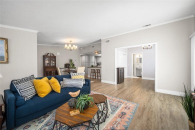 Step inside and be greeted by an expansive open floor plan on Leisure World Seal Beach Golf Course in California - for sale on GolfHomes.com, golf home, golf lot