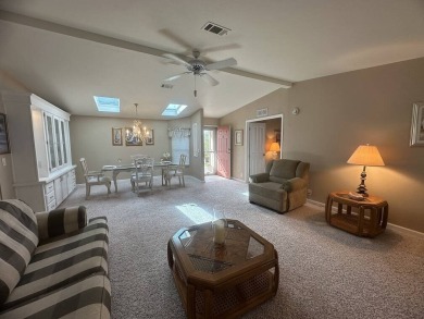 This charming 2-bedroom, 2-bath home offers 1,612 sq ft of on Del Tura Golf and Country Club in Florida - for sale on GolfHomes.com, golf home, golf lot