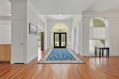 Welcome to Florida living at its finest in the guard-gated on Crescent Oaks Country Club in Florida - for sale on GolfHomes.com, golf home, golf lot