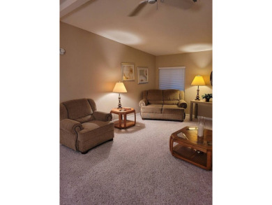 This charming 2-bedroom, 2-bath home offers 1,612 sq ft of on Del Tura Golf and Country Club in Florida - for sale on GolfHomes.com, golf home, golf lot