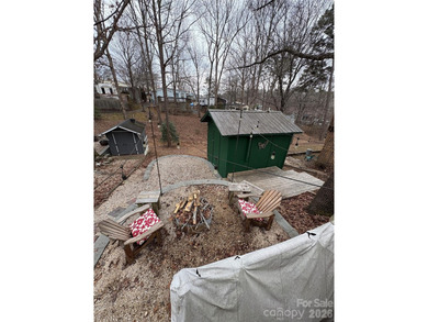 Resort living made easy-just bring your suitcase and start on Old North State Club at Uwharrie Point Golf community in North Carolina - for sale on GolfHomes.com, golf home, golf lot