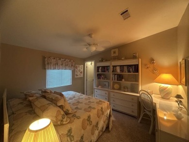 This charming 2-bedroom, 2-bath home offers 1,612 sq ft of on Del Tura Golf and Country Club in Florida - for sale on GolfHomes.com, golf home, golf lot