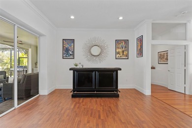 Welcome to Florida living at its finest in the guard-gated on Crescent Oaks Country Club in Florida - for sale on GolfHomes.com, golf home, golf lot