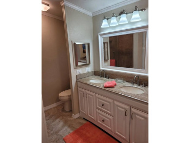 This charming 2-bedroom, 2-bath home offers 1,612 sq ft of on Del Tura Golf and Country Club in Florida - for sale on GolfHomes.com, golf home, golf lot