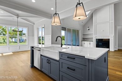 This beautifully appointed 4-bedroom, 3-bath residence offers 3 on Tennessee National Golf Club in Tennessee - for sale on GolfHomes.com, golf home, golf lot