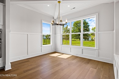 This beautifully appointed 4-bedroom, 3-bath residence offers 3 on Tennessee National Golf Club in Tennessee - for sale on GolfHomes.com, golf home, golf lot