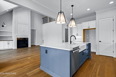 This beautifully appointed 4-bedroom, 3-bath residence offers 3 on Tennessee National Golf Club in Tennessee - for sale on GolfHomes.com, golf home, golf lot