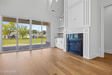 This beautifully appointed 4-bedroom, 3-bath residence offers 3 on Tennessee National Golf Club in Tennessee - for sale on GolfHomes.com, golf home, golf lot