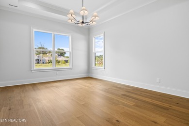 This beautifully appointed 4-bedroom, 3-bath residence offers 3 on Tennessee National Golf Club in Tennessee - for sale on GolfHomes.com, golf home, golf lot