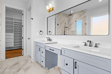 This beautifully appointed 4-bedroom, 3-bath residence offers 3 on Tennessee National Golf Club in Tennessee - for sale on GolfHomes.com, golf home, golf lot