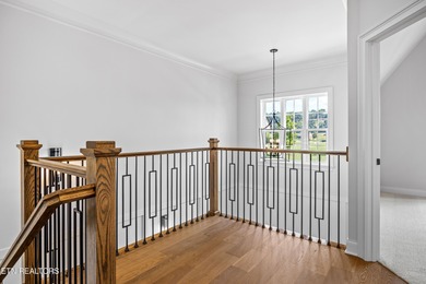 This beautifully appointed 4-bedroom, 3-bath residence offers 3 on Tennessee National Golf Club in Tennessee - for sale on GolfHomes.com, golf home, golf lot