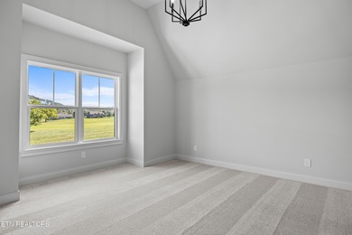 This beautifully appointed 4-bedroom, 3-bath residence offers 3 on Tennessee National Golf Club in Tennessee - for sale on GolfHomes.com, golf home, golf lot