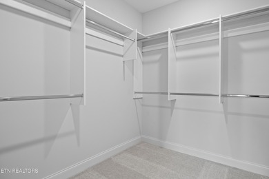 This beautifully appointed 4-bedroom, 3-bath residence offers 3 on Tennessee National Golf Club in Tennessee - for sale on GolfHomes.com, golf home, golf lot