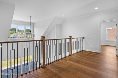 This beautifully appointed 4-bedroom, 3-bath residence offers 3 on Tennessee National Golf Club in Tennessee - for sale on GolfHomes.com, golf home, golf lot