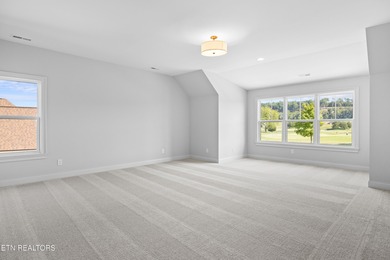 This beautifully appointed 4-bedroom, 3-bath residence offers 3 on Tennessee National Golf Club in Tennessee - for sale on GolfHomes.com, golf home, golf lot