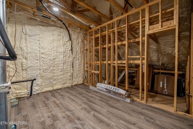 This beautifully appointed 4-bedroom, 3-bath residence offers 3 on Tennessee National Golf Club in Tennessee - for sale on GolfHomes.com, golf home, golf lot