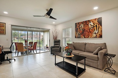 Open the door to this beautifully renovated 1/1.5 bath condo and on Poinciana Golf Club in Florida - for sale on GolfHomes.com, golf home, golf lot