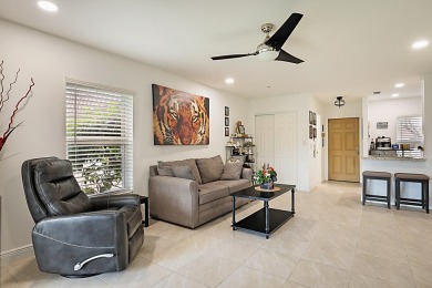 Open the door to this beautifully renovated 1/1.5 bath condo and on Poinciana Golf Club in Florida - for sale on GolfHomes.com, golf home, golf lot