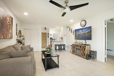 Open the door to this beautifully renovated 1/1.5 bath condo and on Poinciana Golf Club in Florida - for sale on GolfHomes.com, golf home, golf lot