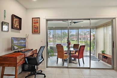 Open the door to this beautifully renovated 1/1.5 bath condo and on Poinciana Golf Club in Florida - for sale on GolfHomes.com, golf home, golf lot